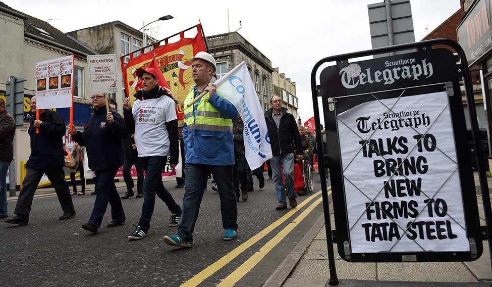 Up in arms: A protest after the loss of 900 jobs at the local Tata Steel works in Scunthorpe, northern England. Ratan Tata is likely to revist the plan to disinvest the sick units | AFP Order in the house