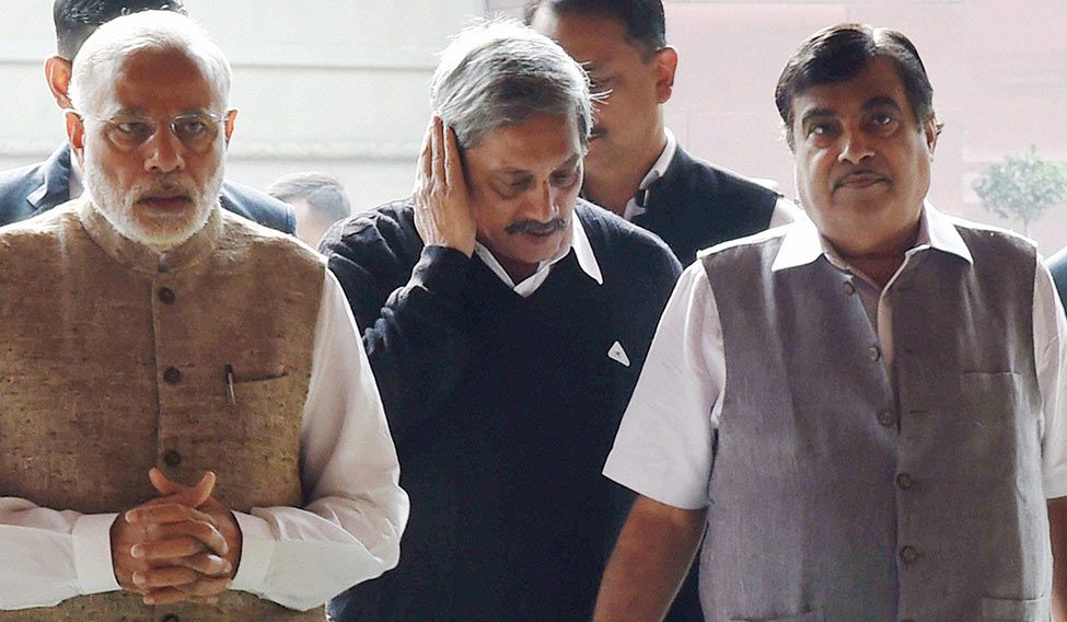 Team spirit: (From left) Narendra Modi, Manohar Parrikar and Nitin Gadkari | PTI Halfway high