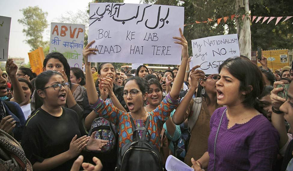 March on: College students in Delhi protesting against the ABVP, after the group was accused of attacking students and faculty members at Delhi University | AP Wounded by a thousand words