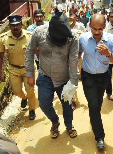 Evidence trail: NIA officials with Subahani Haja Moideen in Thodupuzha, Kerala. He was arrested on charges of supporting Islamic State. Wounds time can’t heal