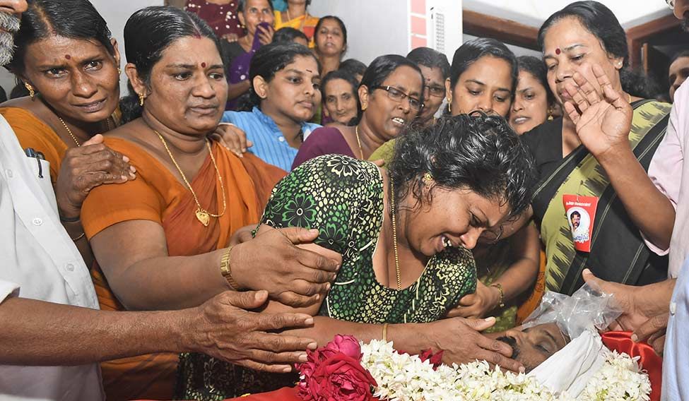 Tearful adieu: CPI(M) leaders consoling Mohanan’s widow, Suchithra. Long live the dead