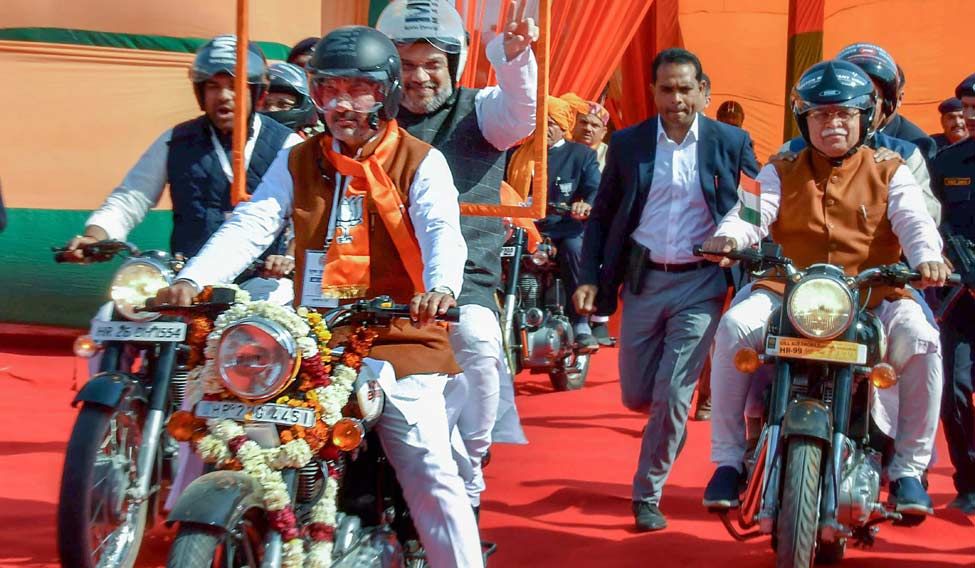 Pillion-riding Amit Shah leads 1L strong rally in Jind, Haryana Pillion-riding Amit Shah leads 1L strong rally in Jind, Haryana