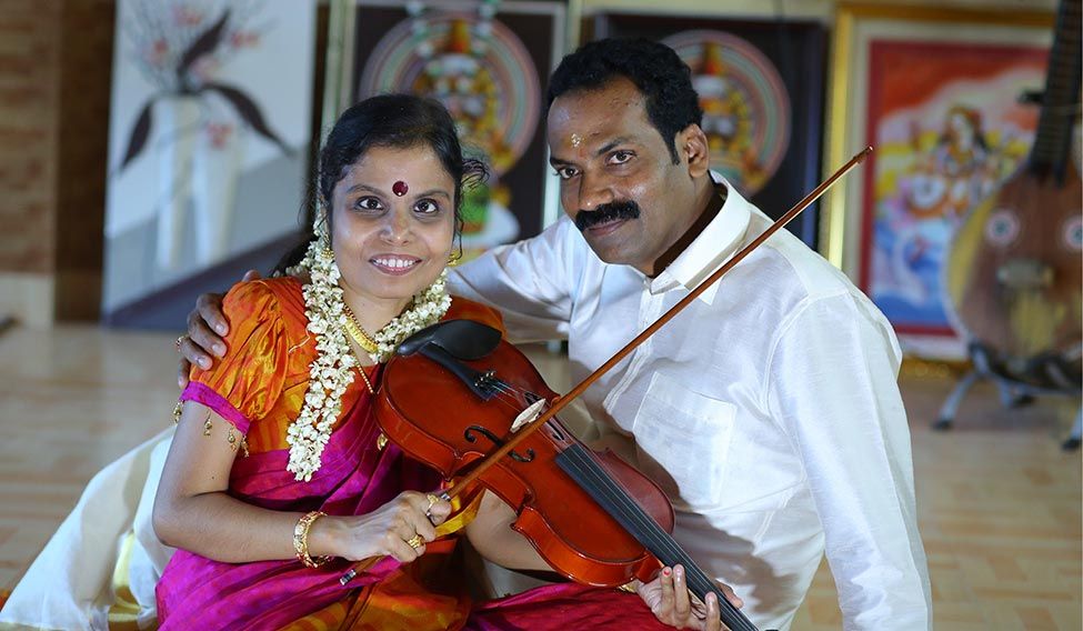 Vijayalakshmi with her fiance, Santosh. Crooning glory