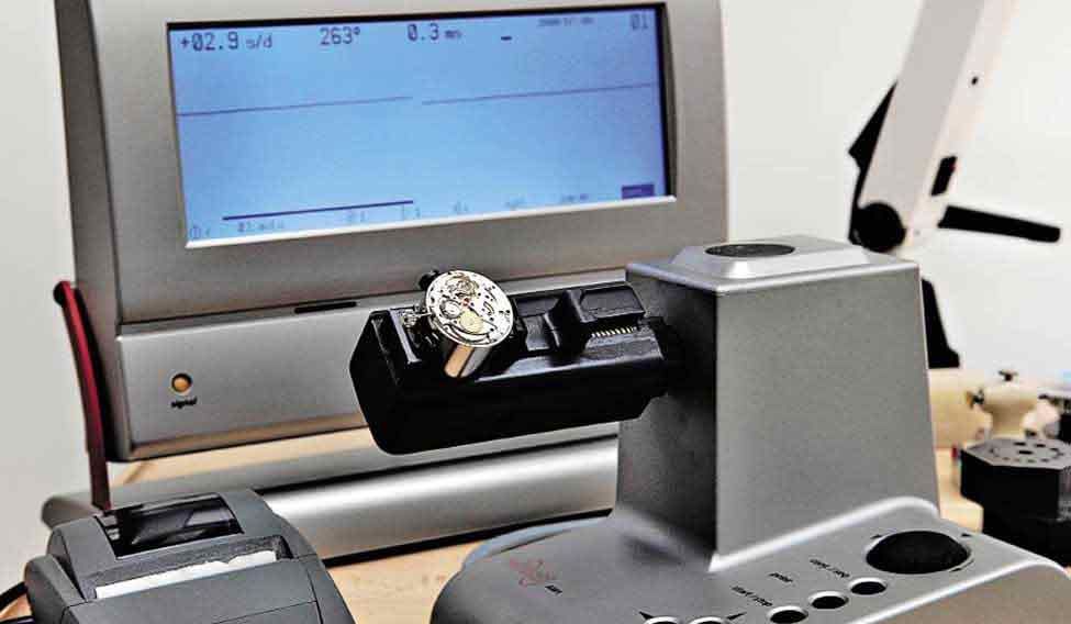 An uncased movement is timed. A day at the Watch Spa