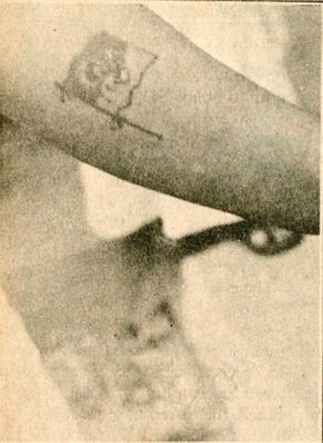 A stigma. The tatooed AIADMK party flag One more Kazhagam
