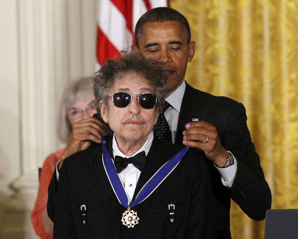 (File) President Barack Obama presents Bob Dylan with a Medal of Freedom during a ceremony at the White House in Washington | AP The many-faced bard