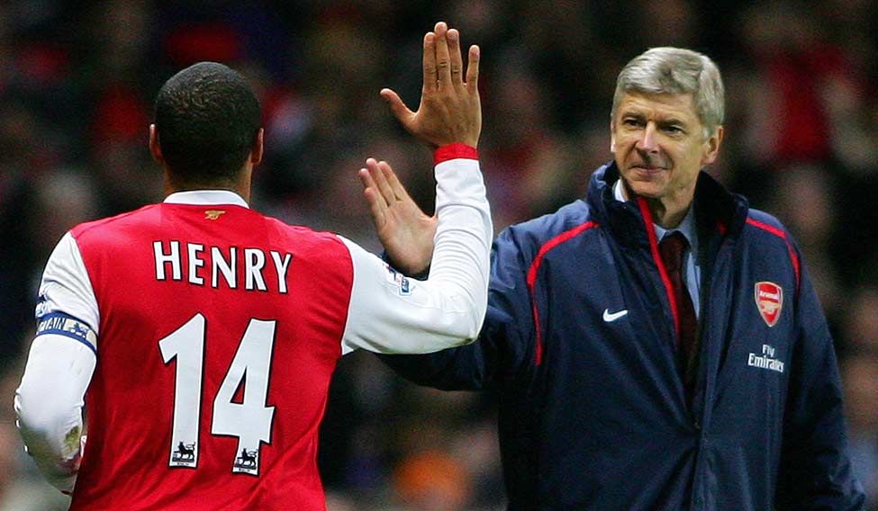 (File) Arsenal captain and French striker Thierry Henry (left) celebrating with Wenger after scoring from a penalty shot during their Premiership match against Charlton in 2007 | AFP Arsene Wenger: Twenty and counting
