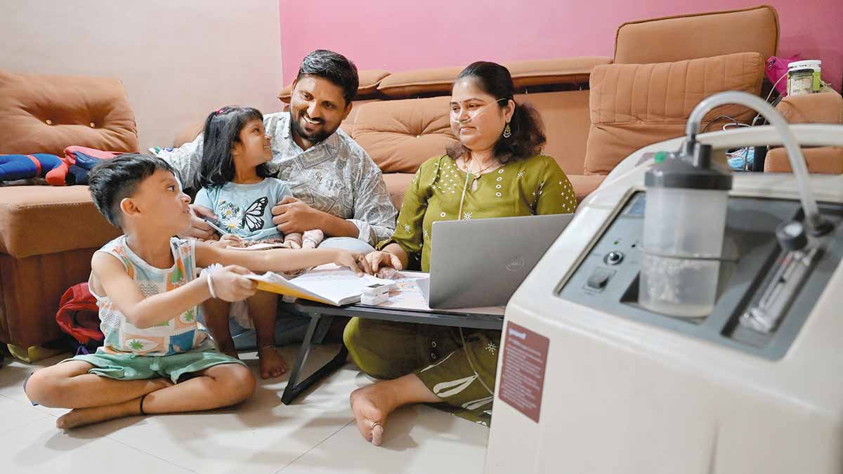 Smiling through struggles: Sunayana Ghadge, who is waiting for a lung transplant, with husband Sushant, daughter Mauli and son Malhar at their Navi Mumbai home | Amey Mansabdar