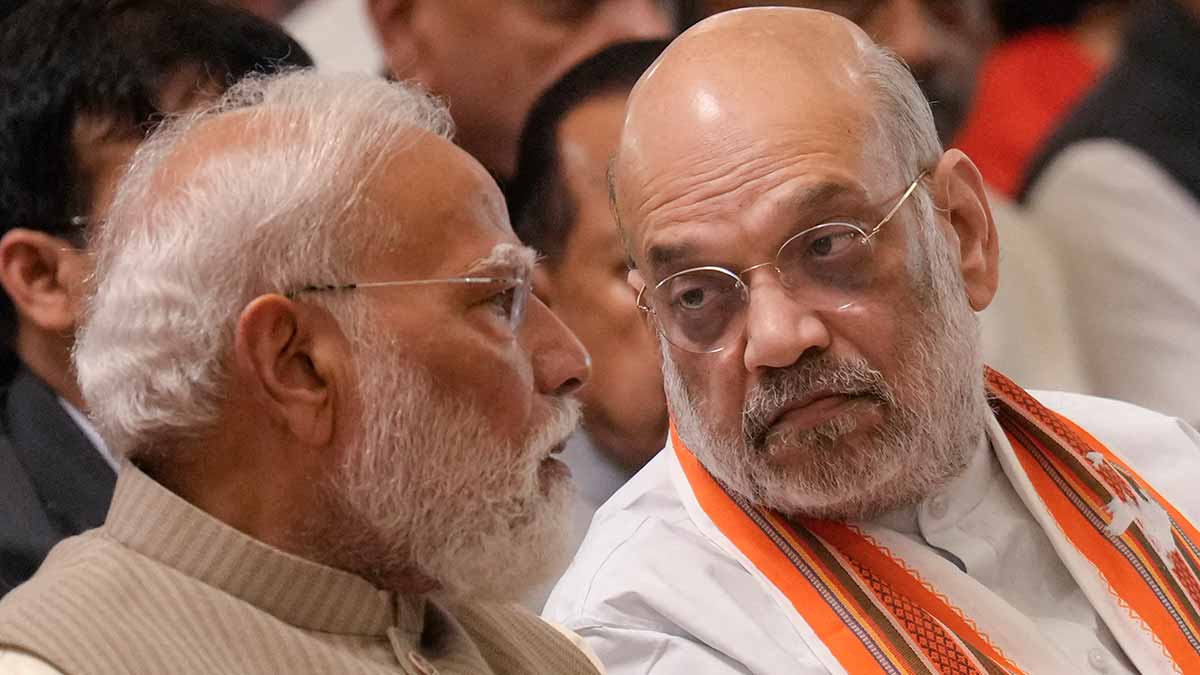 Power talks: Prime Minister Narendra Modi and Union Home Minister Amit Shah. Shah has accused the Congress of trying to protect illegal infiltrators under the cover of its opposition to SIR | PTI