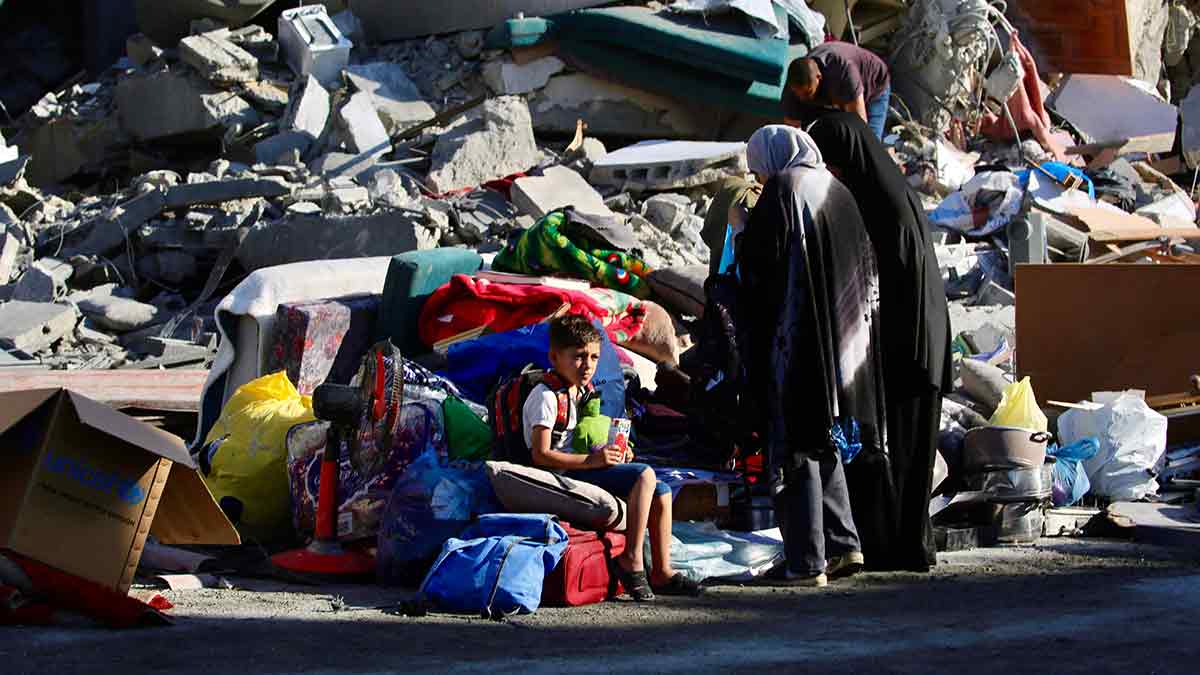 Hopes reduced to rubble: A Palestinian boy sits near the debris of a house destroyed in an Israeli strike on Zawaida in Gaza on June 5 | AFP