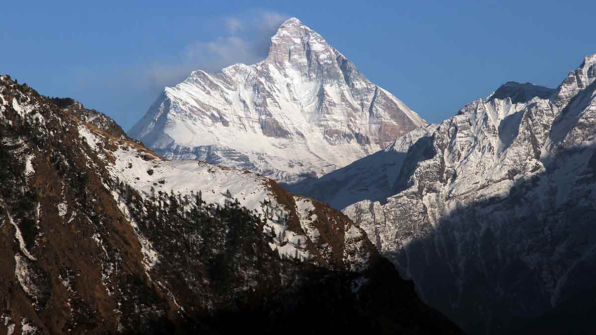 Silent sentinel: Snow-covered Nanda Devi seen from Auli town in Uttarakhand | REUTERS