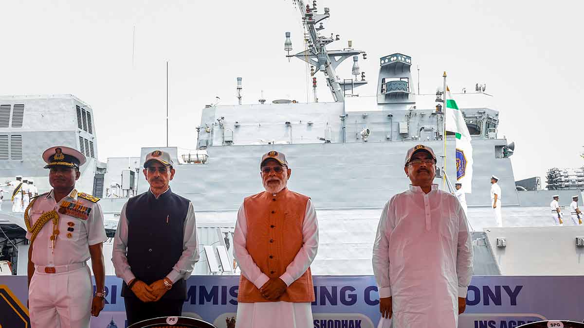 Growing strength: Prime Minister Modi with (from right) West Bengal Chief Minister Suvendu Adhikari, Governor R.N. Ravi and Chief of the Naval Staff Admiral Krishna Swaminathan during the commissioning ceremony of INS Dunagiri, INS Sanshodhak and INS Agray at Syama Prasad Mookerjee Port in Kolkata | PTI