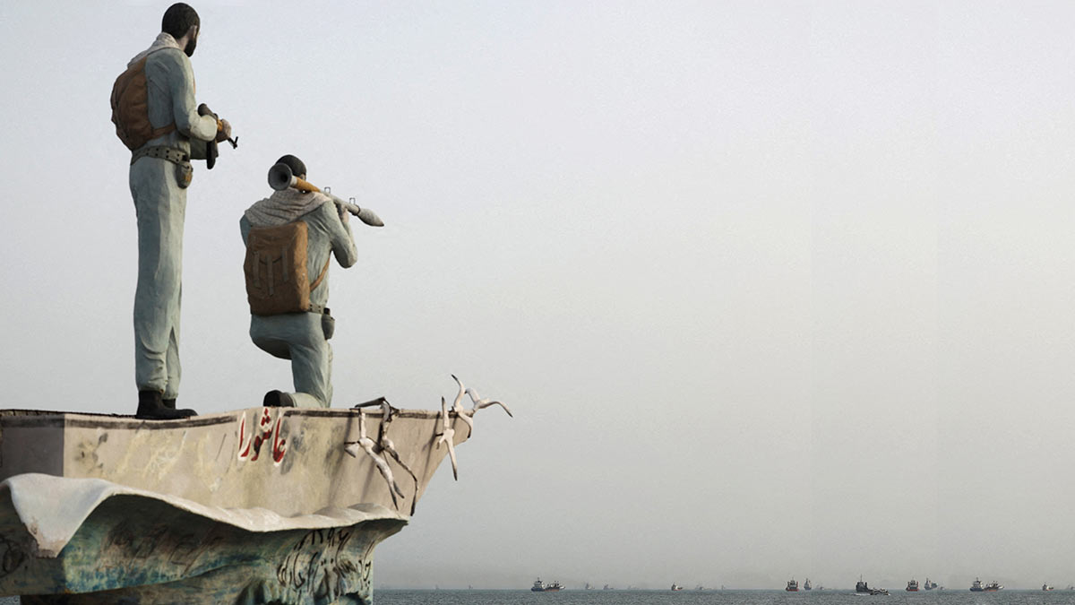 On guard: A statue of Iranian military men overlooking the Strait of Hormuz, as vessels pass by near the beach of Bandar Abbas, Iran | REUTERS