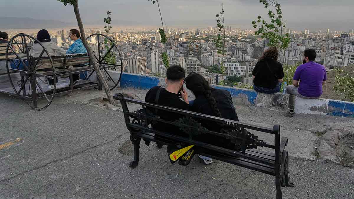 Resilience in action: People spend a Friday afternoon in a picnic spot in Tehran on May 15 | AP