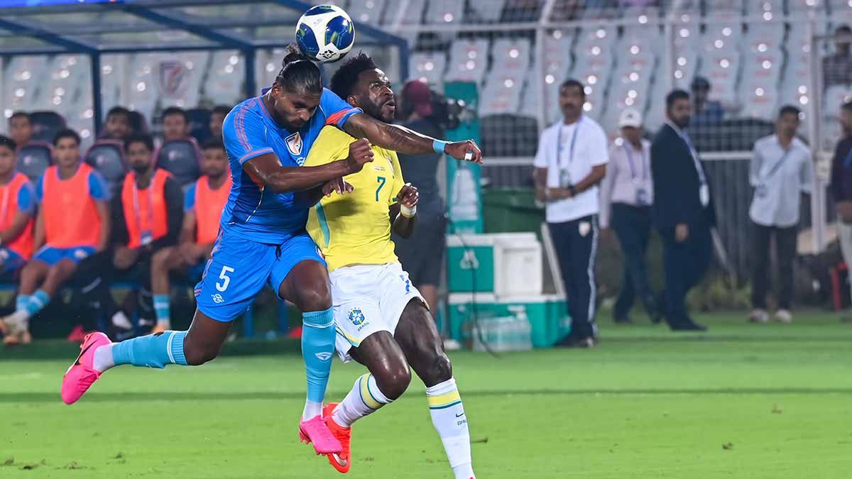 Star, struck: Indian centre-back Bijoy Varghese challenges Brazil’s Real Madrid winger Vinicius Jr | Salil Bera