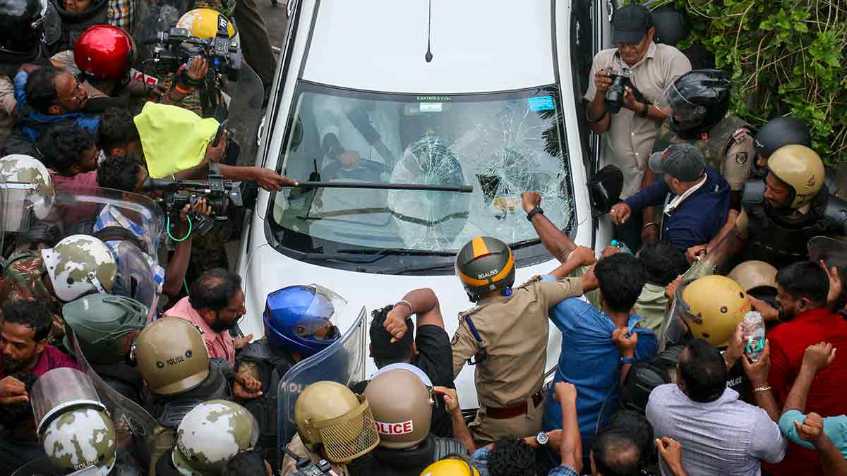 A case of anger: The vehicle carrying ED officials being attacked outside Pinarayi Vijayan’s residence on May 27 | PTI