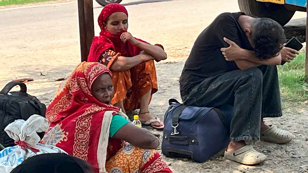 The long road home: Taslima Khatoon (centre), an undocumented immigrant from Bangladesh, at the Hakimpur check post | Prema Rajaram