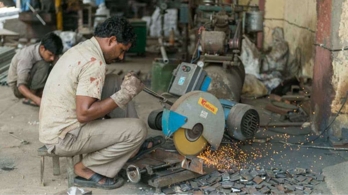Representative image of a man working with a metal cutting machine at an MSME enterprise in Uttar Pradesh | Shutterstock