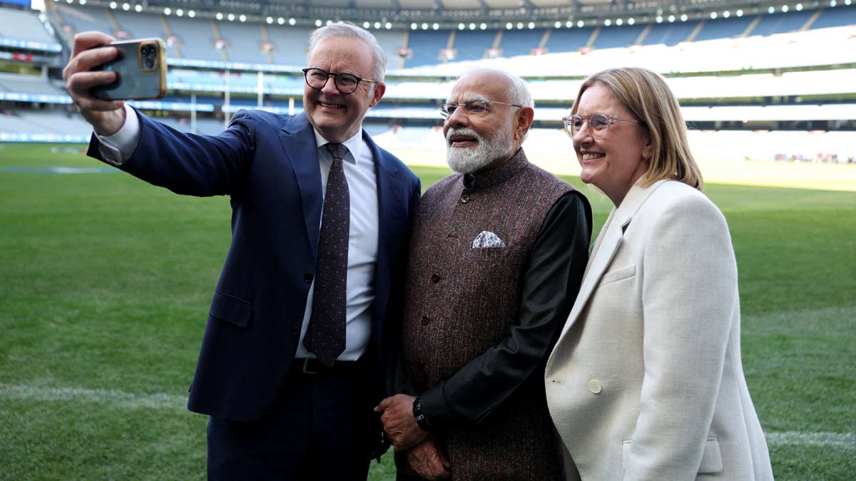 Australian Prime Minister Anthony Albanese, Prime Minister Narendra Modi, and Premier of Victoria Jacinta Allan take a selfie at the Melbourne Cricket Ground | Reuters