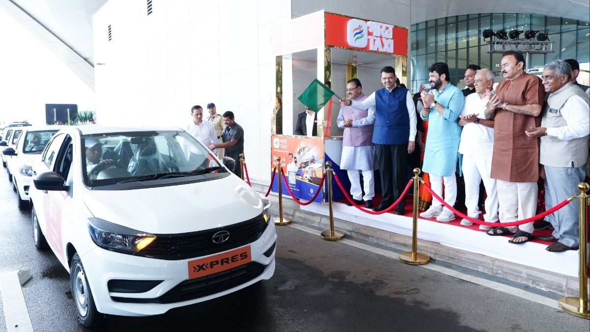 Maharashtra chief minister Devendra Fadnavis flags off the Bharat Taxi service at Navi Mumbai International Airport | X