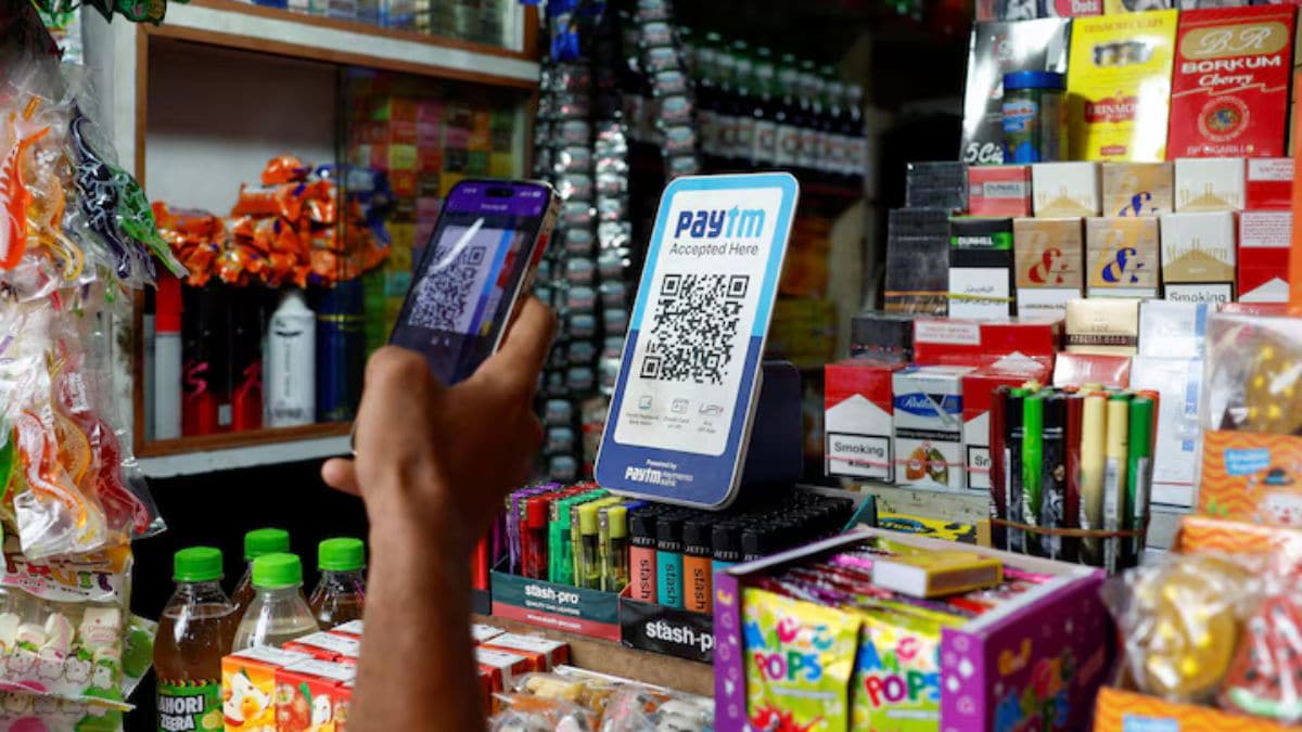 Representative image of a person scanning a QR code to make a UPI payment | Reuters