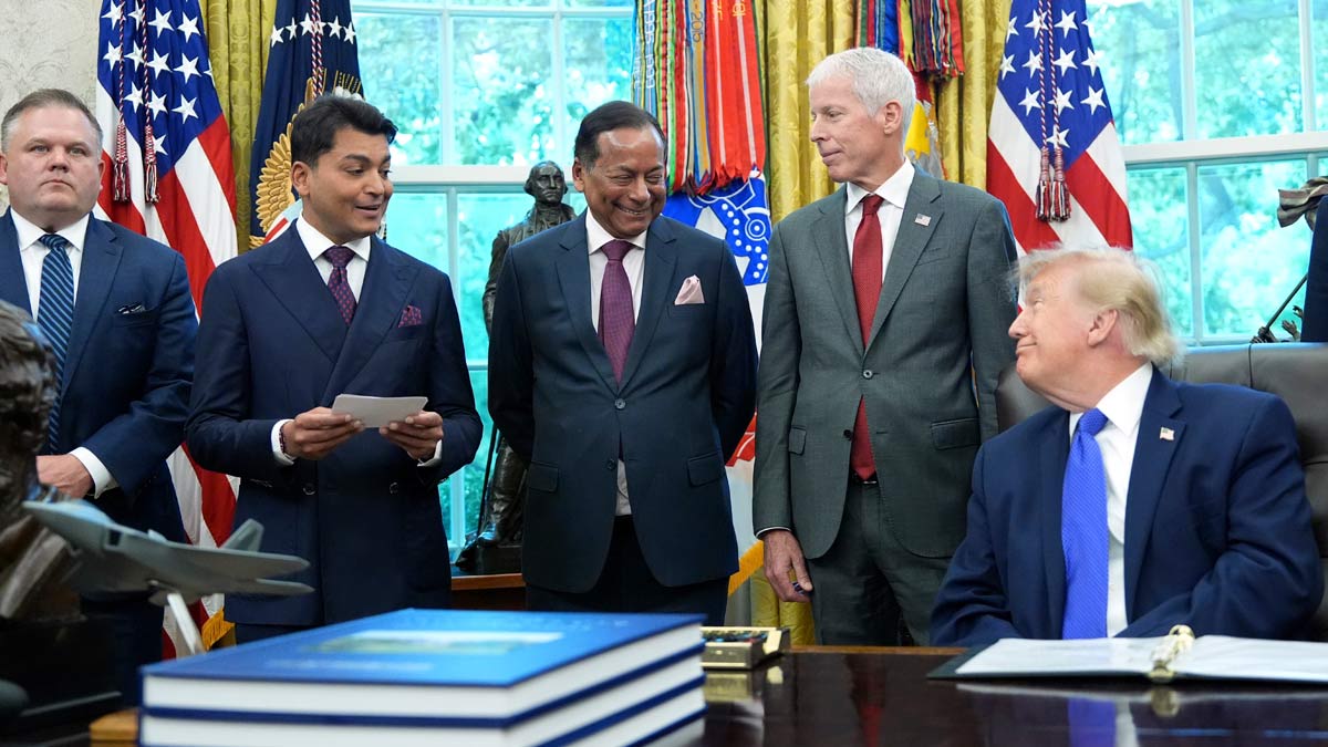 Mesabi Metallics Chairman Rewant Ruia speaks as President Donald Trump, from right, Energy Secretary Chris Wright, Essar Capital Director Prashant Ruia and Mesabi Metallics CEO Joe Broking listen in the Oval Office of the White House | AP