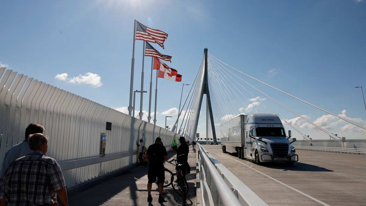 Trucks cross in to the United States on the Gordie Howe International bridge that connects Windsor, Ontario, Canada and Detroit, Michigan | AFP