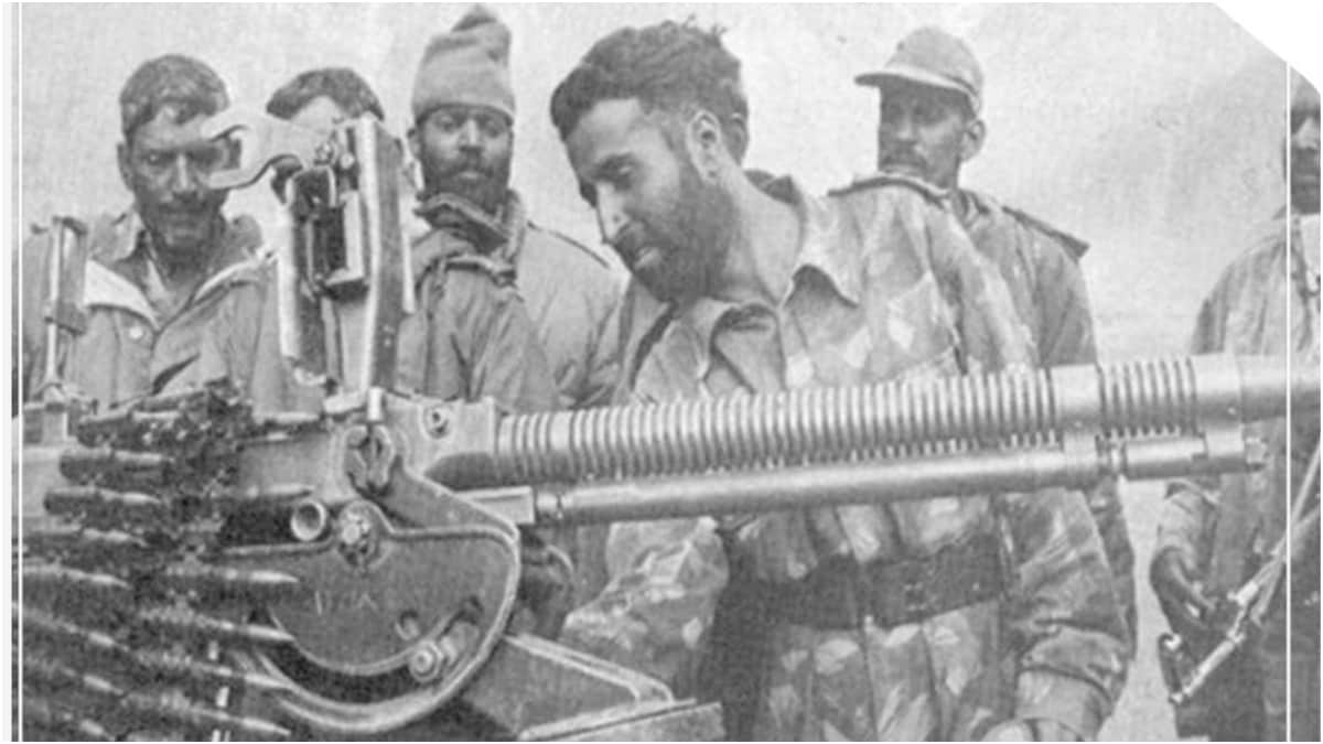 Captain Vikram Batra and his troops with the captured enemy weapon | X