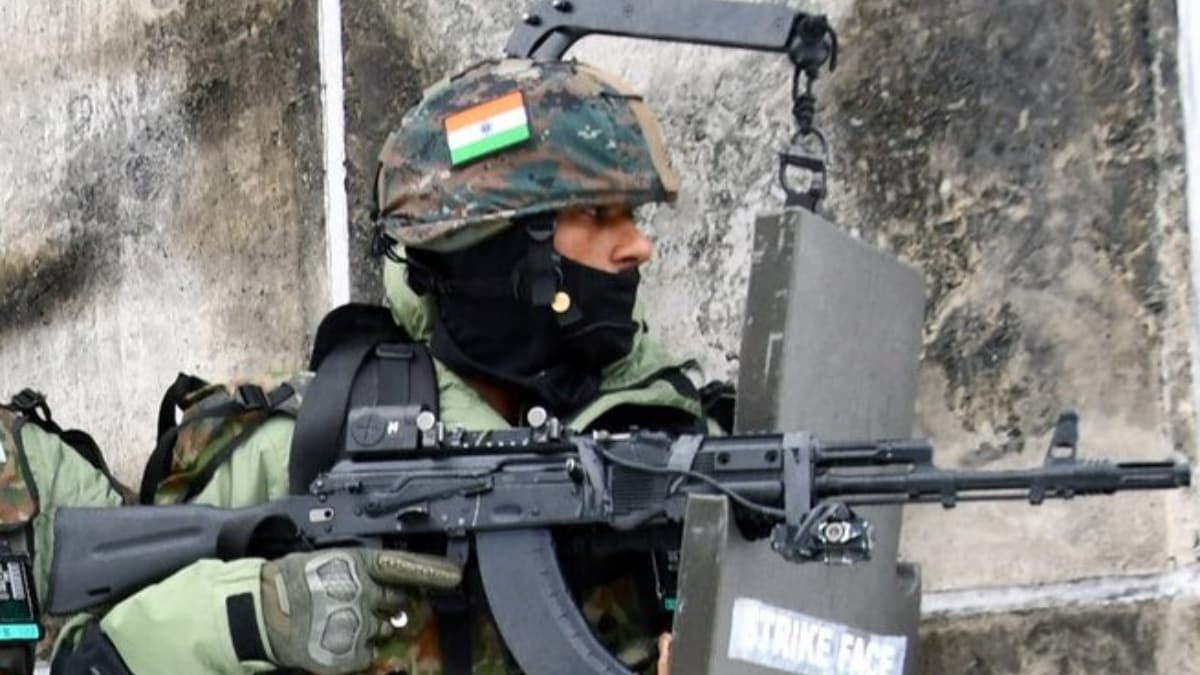 An AK-203 rifle | X