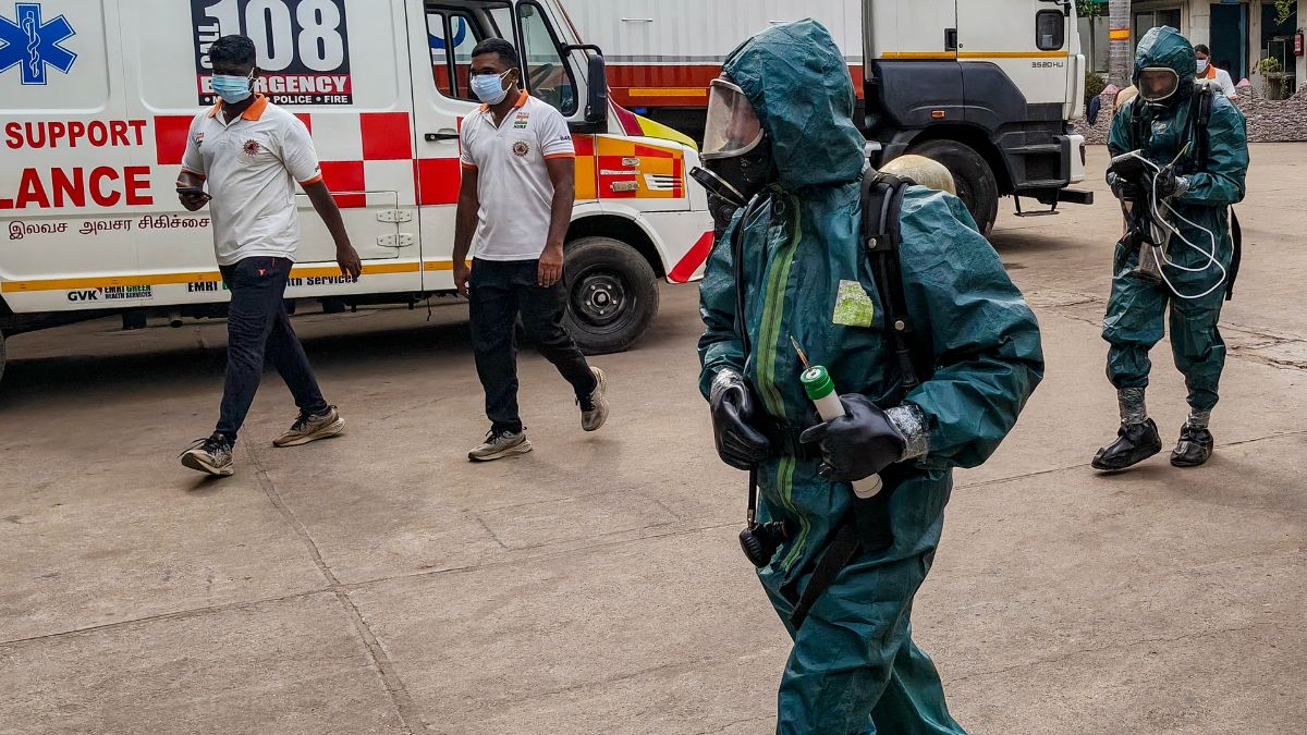 National Disaster Response Force (NDRF) personnel arrive at a seafood export unit following an ammonia gas leak, in Manjangaranai, Thiruvallur district, Tamil Nadu | PTI