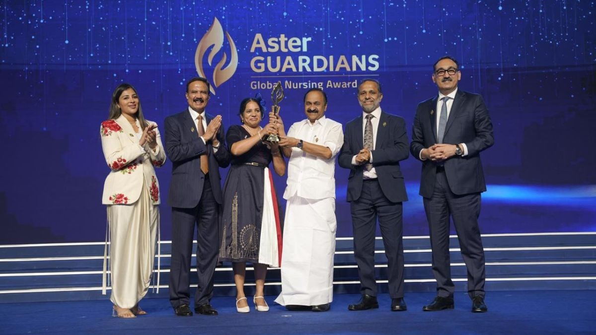 Kerala Chief Minister V.D. Satheesan presents the cash prize of $250,000 (₹2.38 crore) to Agimol Pradeep at an event held in Kochi