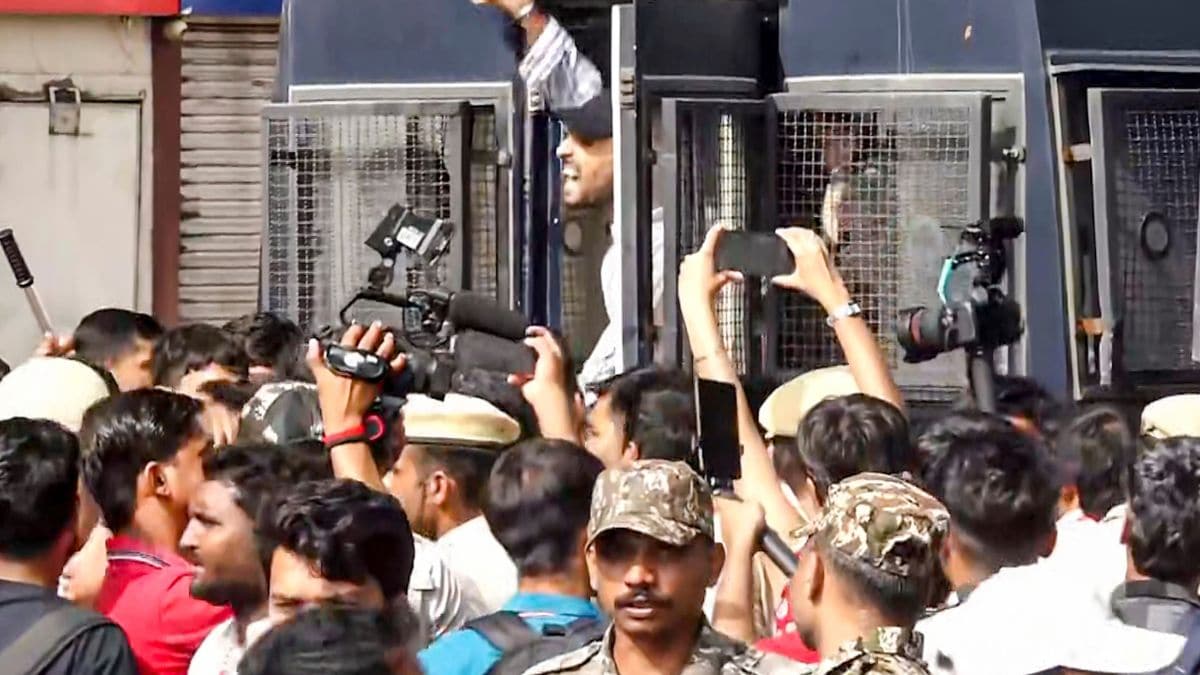 Police personnel detain Cockroach Janta Party (CJP) supporters demonstrating against CEC Gyanesh Kumar, at Connaught Place, in New Delhi | PTI (Screengrab)