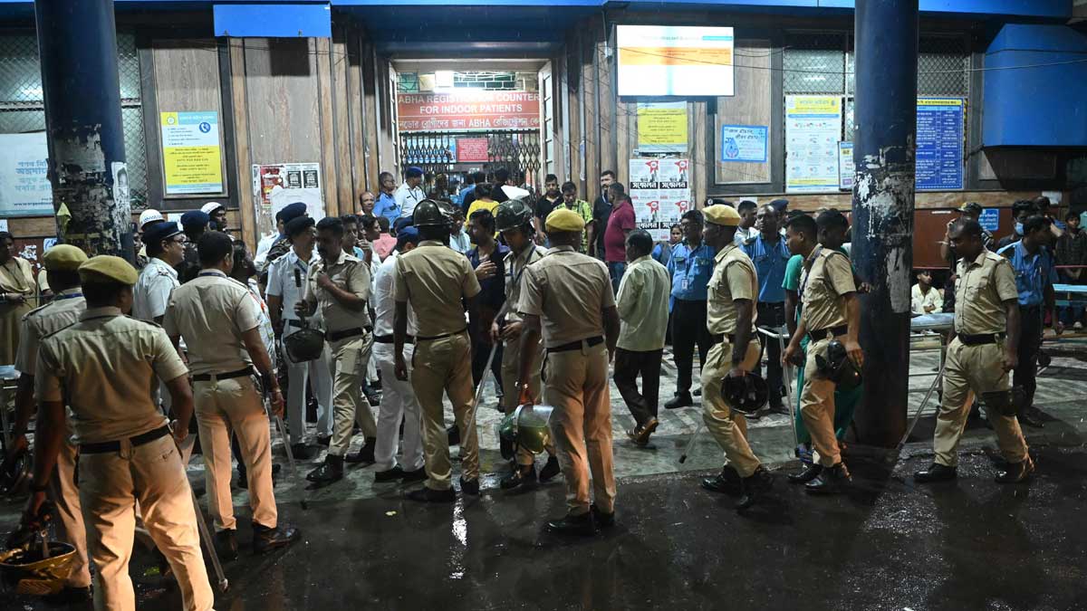 Police and emergency workers stand near the emergency building of Calcutta Medical College and Hospitals | PTI