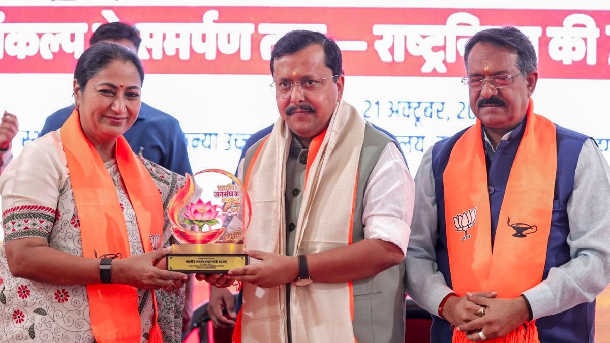Delhi Chief Minister Rekha Gupta (L) and BJP National President Nitin Nabin (centre) during an event marking the 75th foundation day of Bharatiya Jana Sangh, in New Delhi | PTI