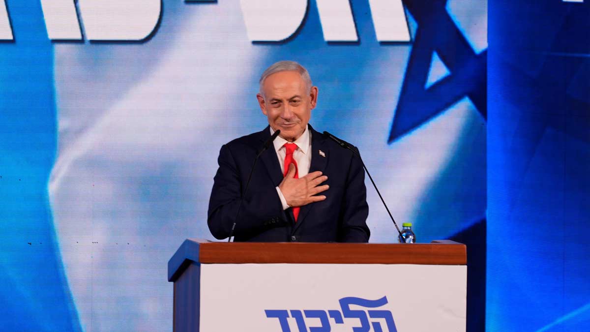 Israeli Prime Minister Benjamin Netanyahu gestures as he speaks to supporters at Likud party headquarters in Jerusalem | AP