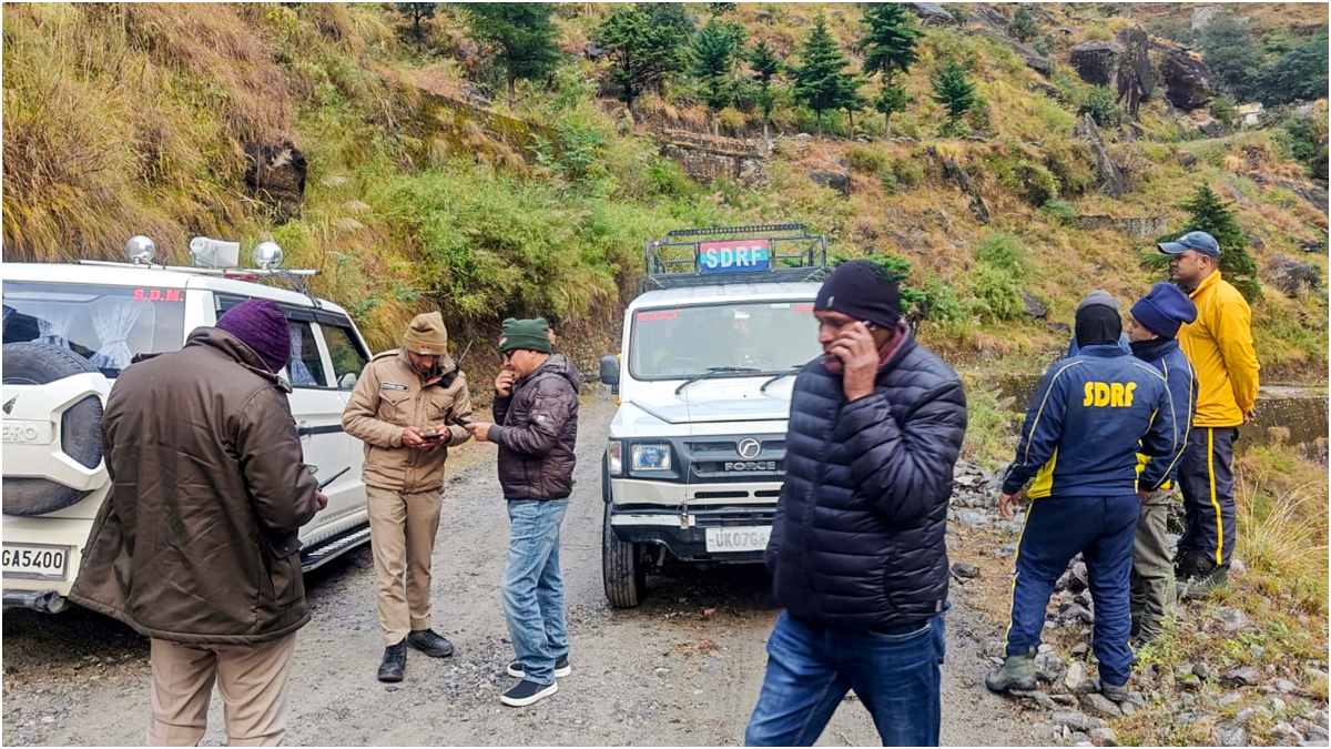 SDRF and other security personnel conduct a search and rescue operation at the site after a helicopter carrying six people on board, including the pilot, crashed into a hillside near Joshimath | PTI