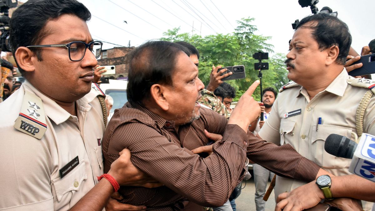 Aam Janata Unnayan Party (AJUP) chief Humayun Kabir engages in an argument with police personnel before being detained over alleged police interference during the Assembly by-election in Rejinagar | PTI 