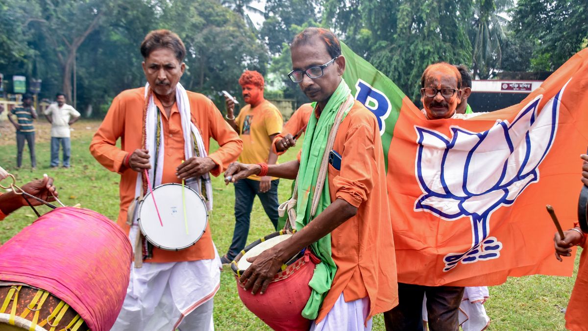 BJP supporters celebrate amid the counting of votes for the Rejinagar Assembly by-election, in Murshidabad district, West Bengal | PTI