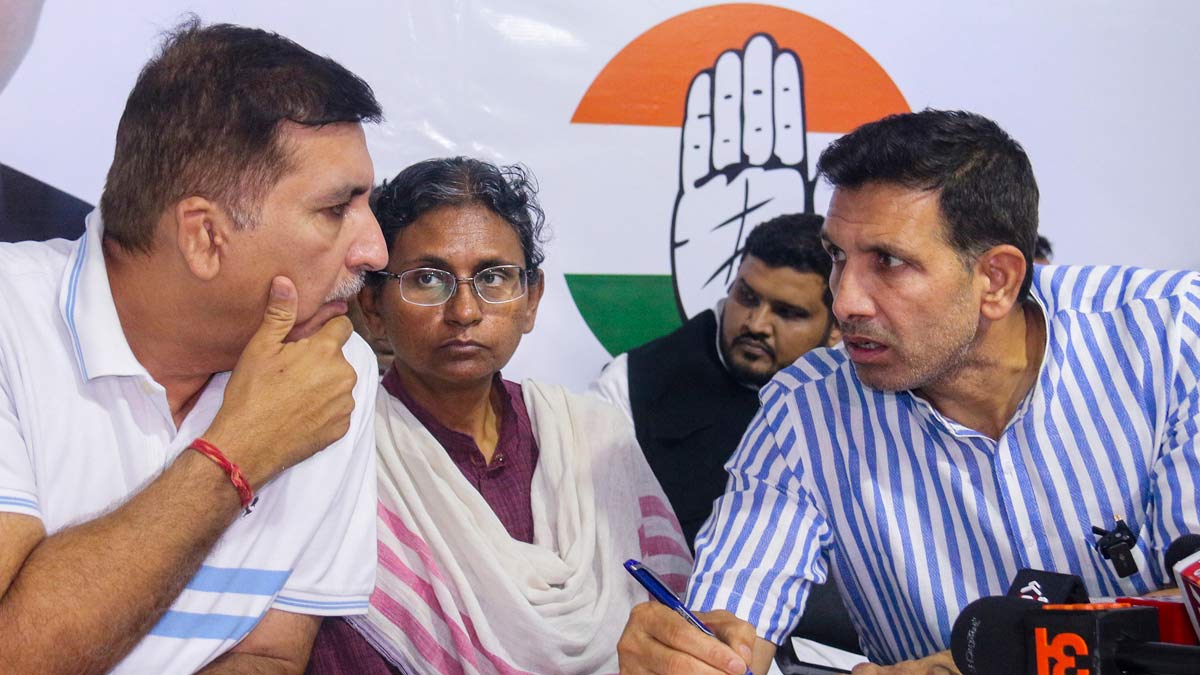 Congress candidate Meenakshi Natarajan, centre, along with AICC general secretary Harish Chaudhary, left, and Congress Madhya Pradesh President Jitu Patwari during a press conference in Bhopal | PTI