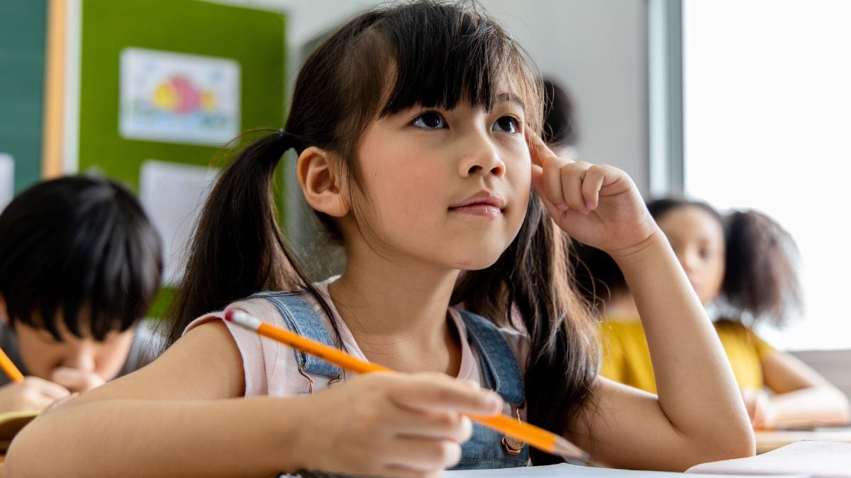 Representative image of a child studying | Envato