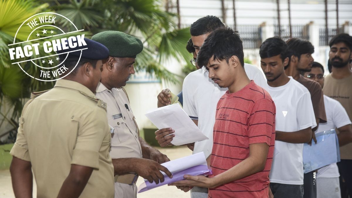Representative image of students being checked before writing an exam
