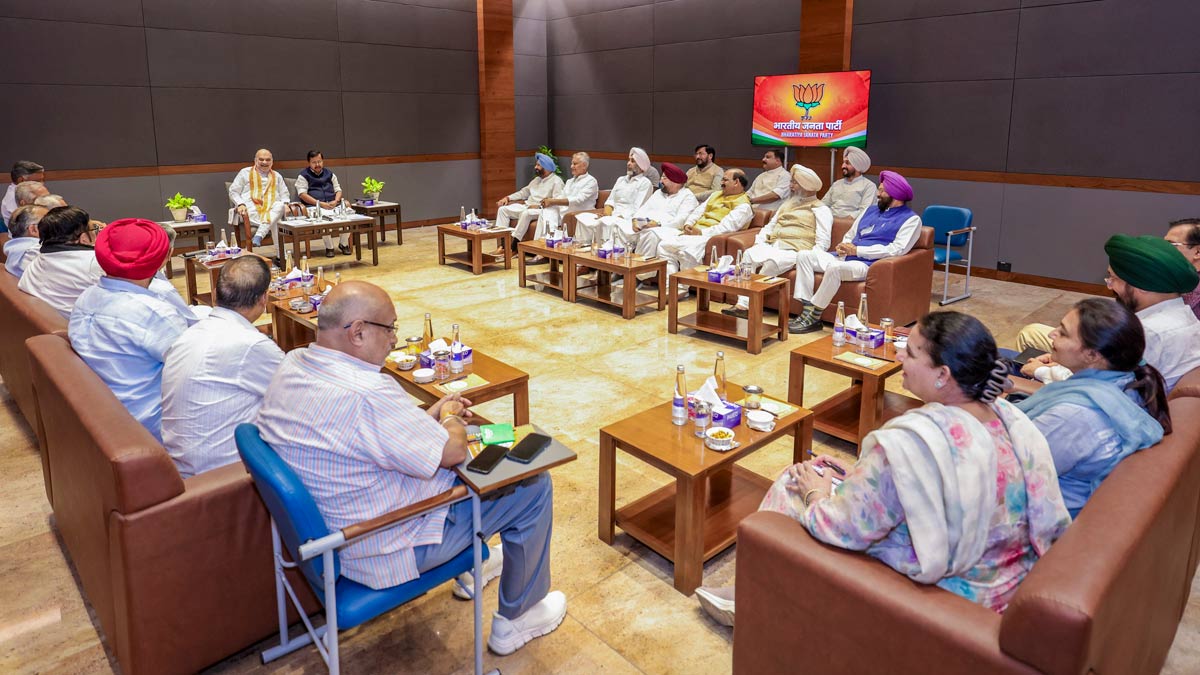 [File] Union Home Minister Amit Shah along with BJP national president Nitin Nabin chairs a meeting with Punjab BJP office bearers at BJP central office in New Delhi on June 13 | PTI