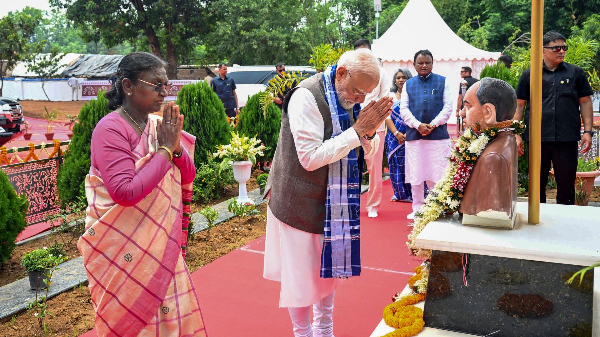 President Droupadi Murmu and Prime Minister Narendra Modi during their visit to Pahadpur village, in Mayurbhanj district, Odisha | PTI