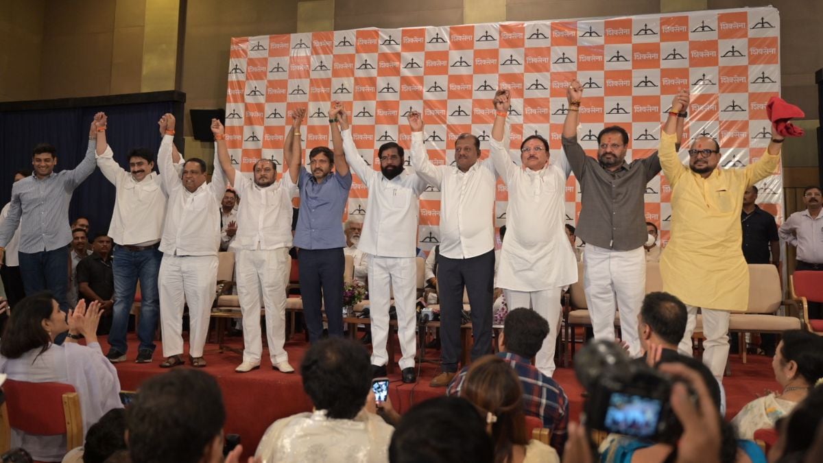 Maharashtra Deputy CM Eknath Shinde (fifth from right) joins hands with the rebel MPs who confirmed their split from the Shiv Sena (UBT) on June 22, 2026 | Amey Mansabdar