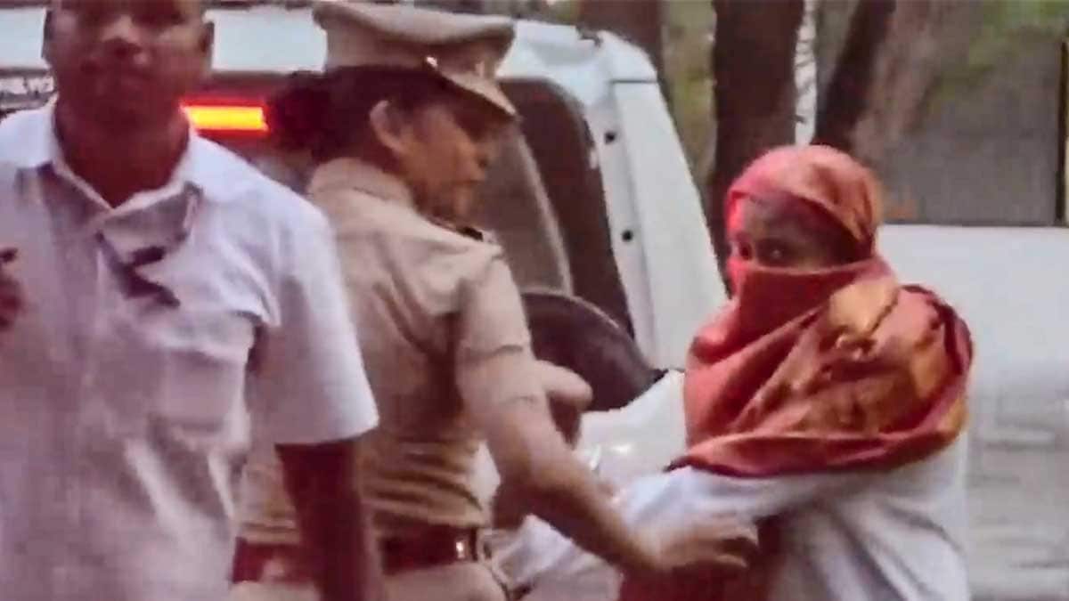 Accused Siya Goyal is escorted by police outside the Vadgaon Maval Court after the court remanded her and co-accused Chetan Chaudhari to seven-day police custody, in Pune | PTI