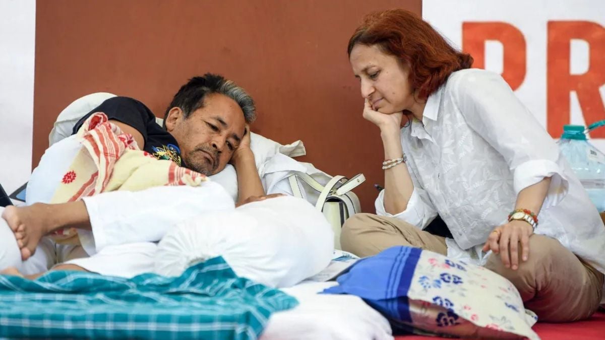 [File] Renowned educationist and activist Sonam Wangchuk (L) and his wife, Gitanjali Angmo (R), also an educationist and entrepreneur, at the site of the Cockroach Janta Party protest against the resignation of Union Education Minister Dharmendra Pradhan, where Wangchuk has been on a hunger strike since June 28 | Reuters
