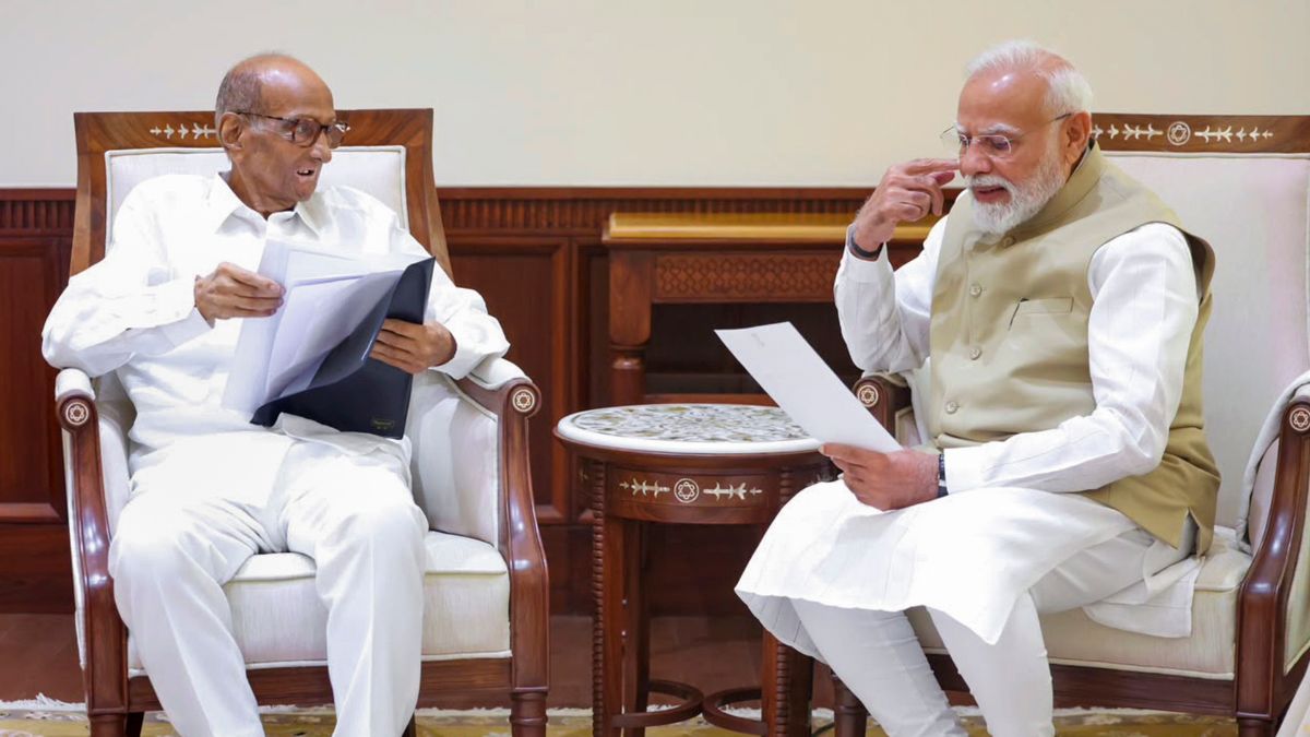 Prime Minister Narendra Modi interacts with NCP (SP) President Sharad Pawar during a meeting, at Parliament House, in New Delhi | PTI 