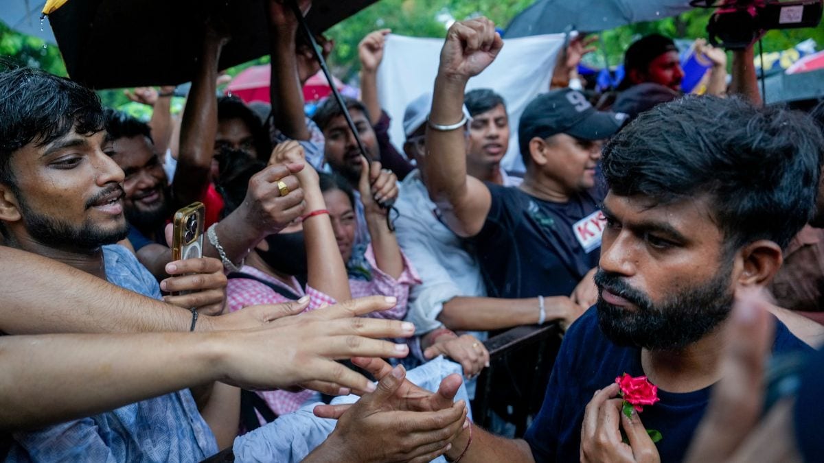 Cockroach Janata Party founder (CJP) Abhijeet Dipke meets supporters as they stage a protest at Jantar Mantar, in New Delhi | PTI