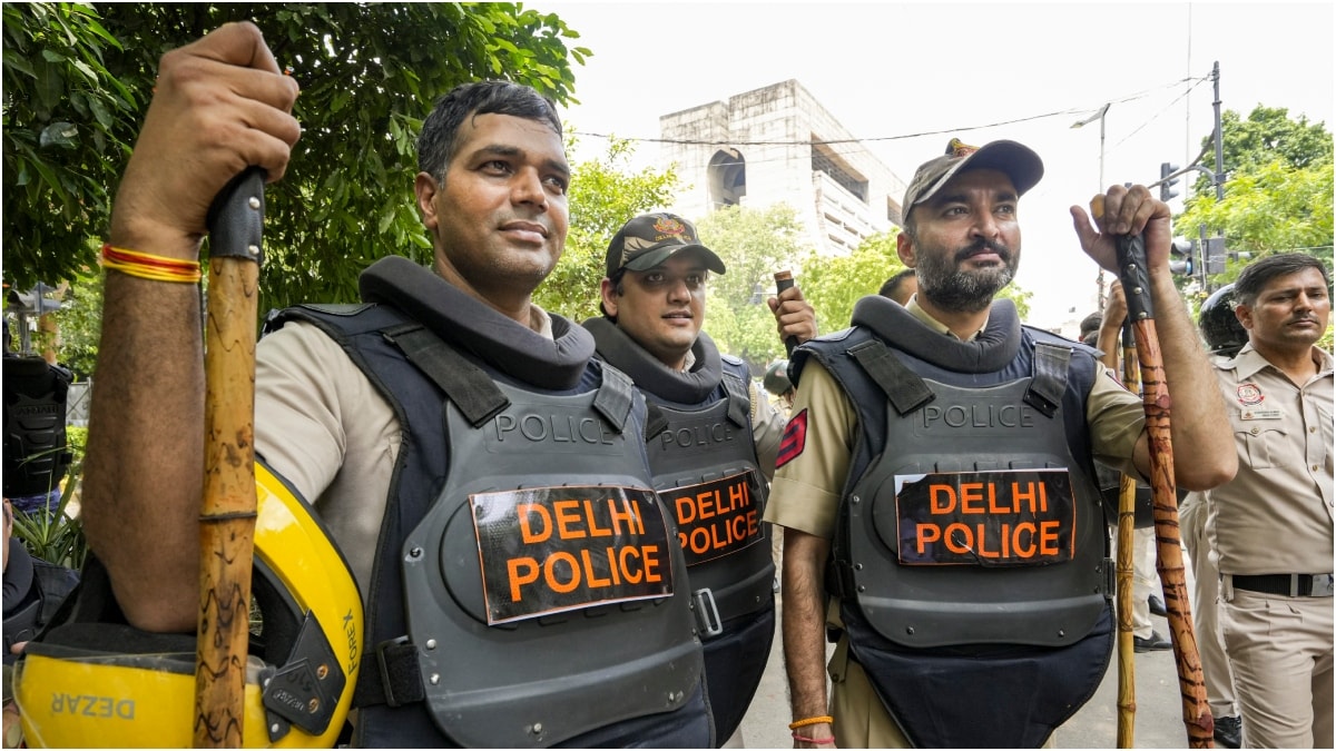 Delhi Police personnel in protective gear stand guard at Jantar Mantar during the ongoing protest over the alleged NEET-UG examination irregularities | PTI