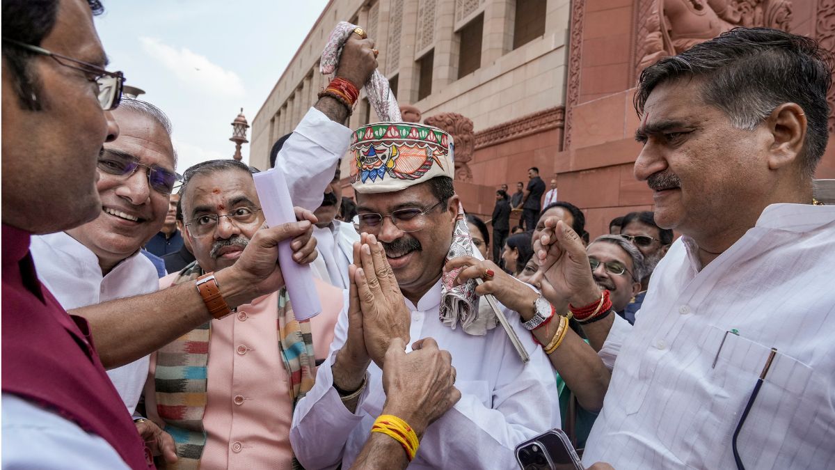 Former Union Education Minister Dharmendra Pradhan being greeted during the Monsoon session of Parliament | PTI